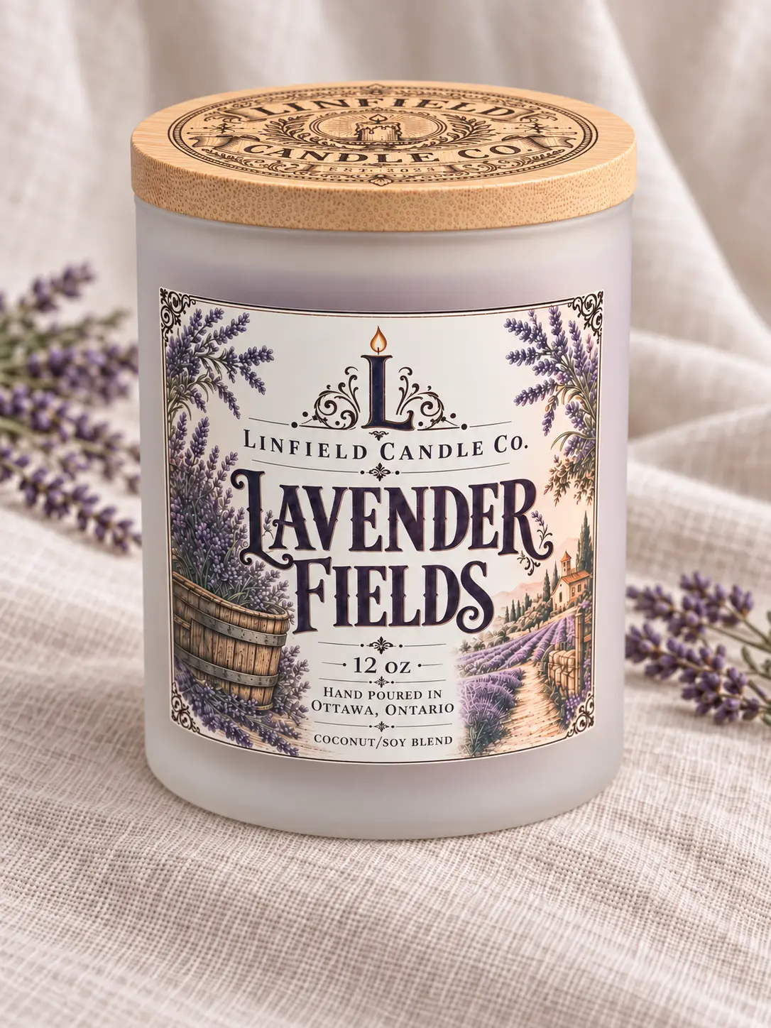 Lavender Fields two-wick coconut soy candle styled with soft linen and lavender sprigs